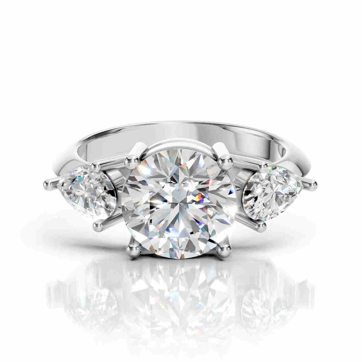 Trilogy Engagement Ring with Round & Pear Diamond