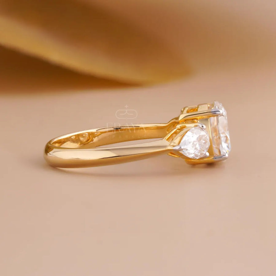 Trilogy Engagement Ring with Round & Pear Diamond