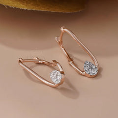 Twisted Hoop Earrings with Pear Diamond Cluster