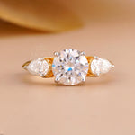 Trilogy Engagement Ring with Round & Pear Diamond