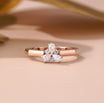 Pear Cut Engagement Ring with Floral Cluster