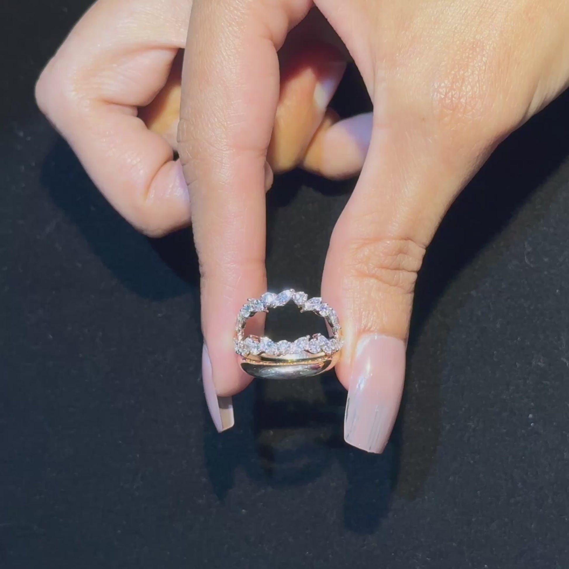 Video showing the leaf diamond ring worn on hand, displaying movement and shine.