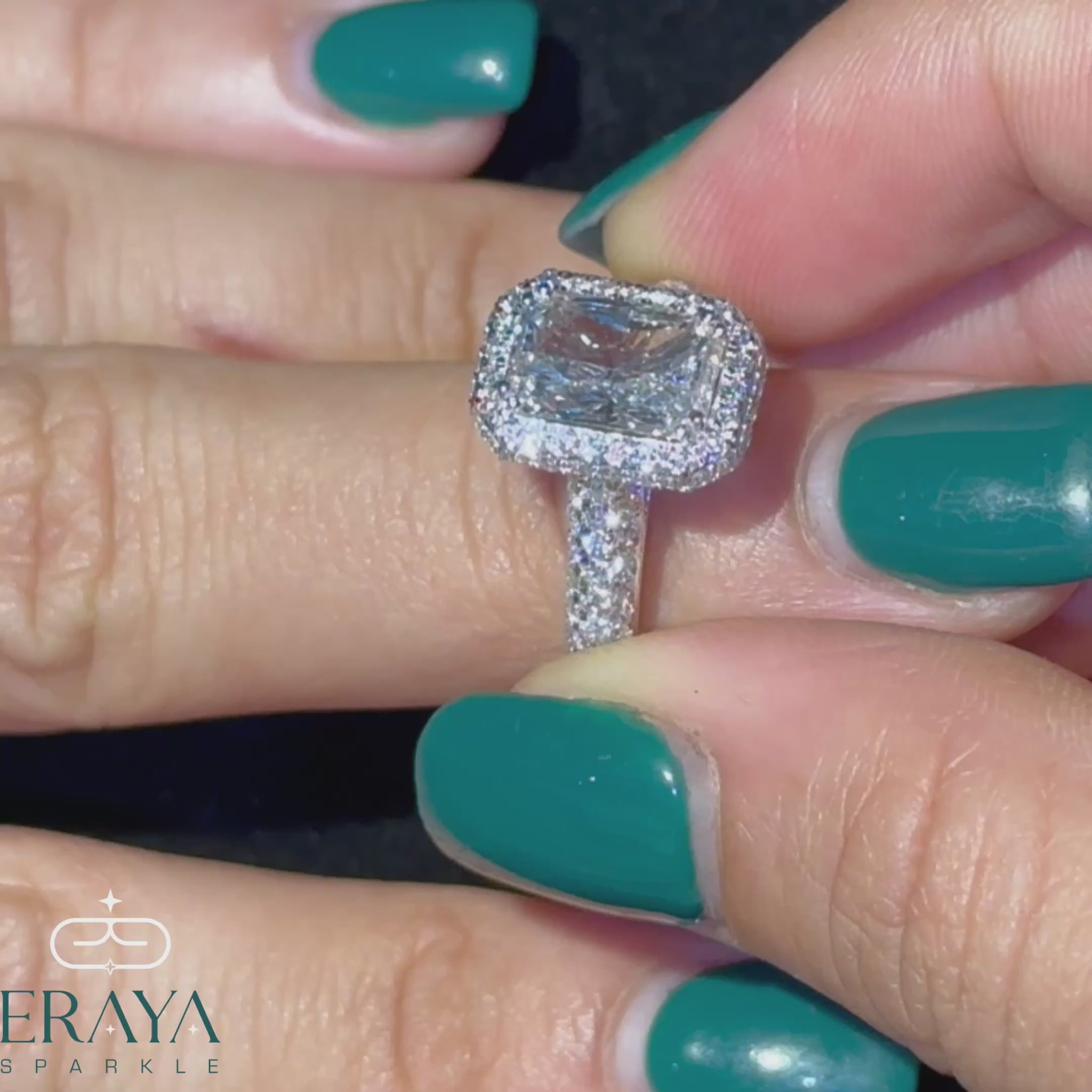 side profile of emerald cut diamond showing secure prong setting