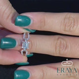 Elegant emerald cut diamond ring with accent diamonds