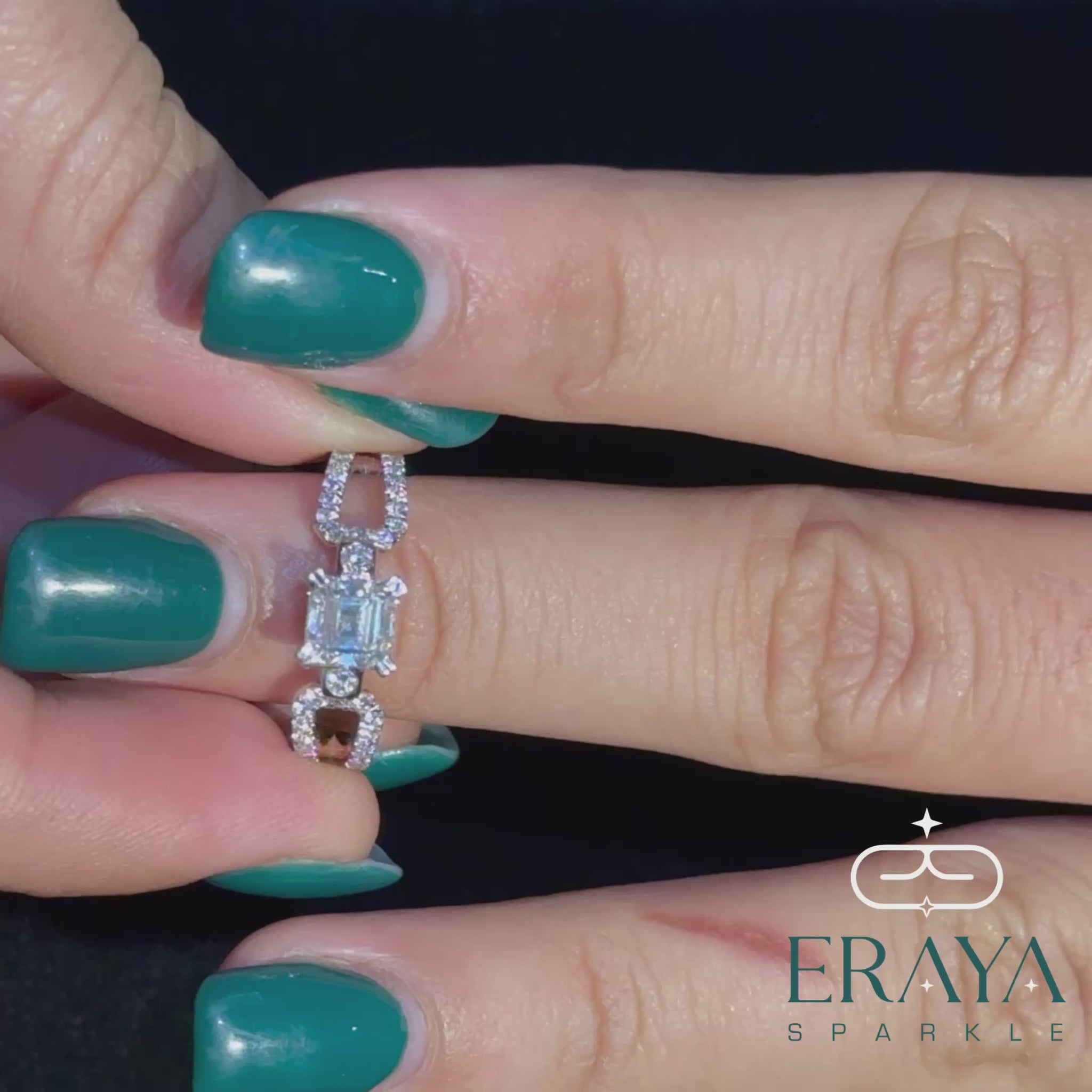 Elegant emerald cut diamond ring with accent diamonds